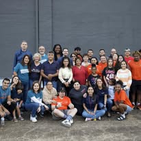WeHOP volunteers and families together at a community event
